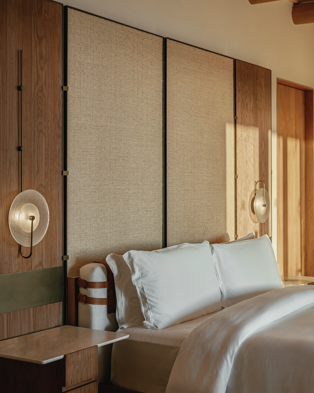 Beyond the Floor: Rugs as Headboard Textiles