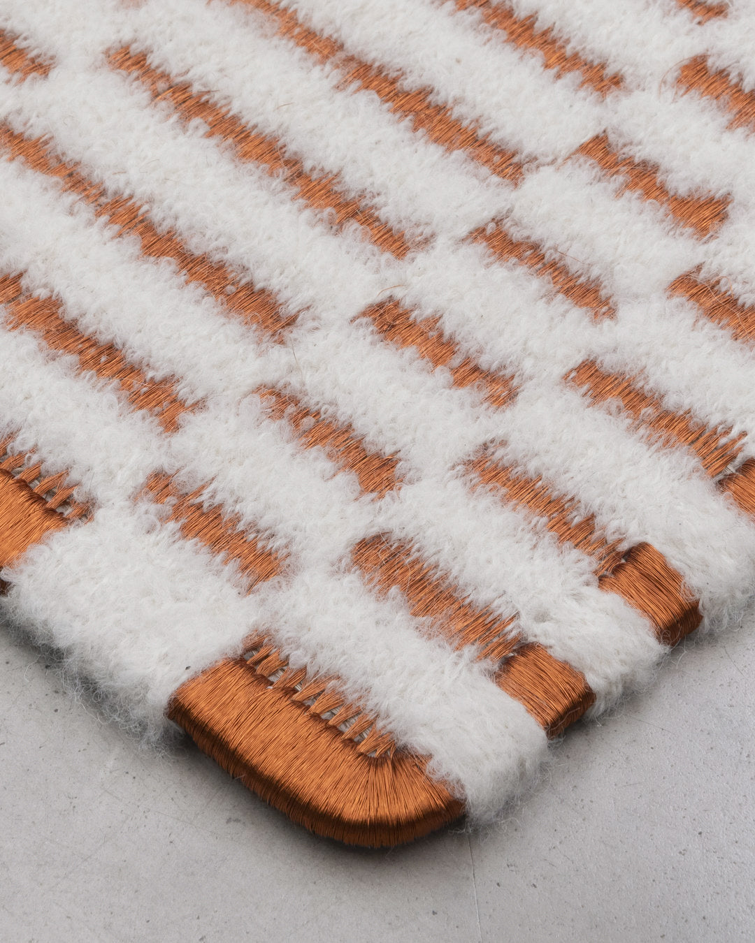 AXXIS WEAVE RUG IN COPPER AND BOUCLÉ ALPACA